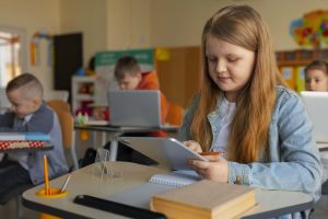 medium-shot-kids-learning-school copy